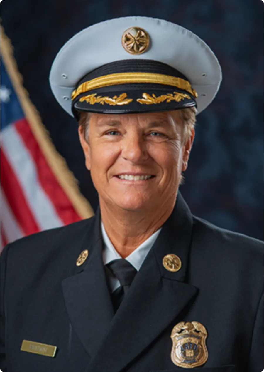 Official portrait of Jaime Brown in fire service dress uniform